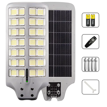 All in one solar street light front and back side view, complete package with remote, batteries, mounting screw