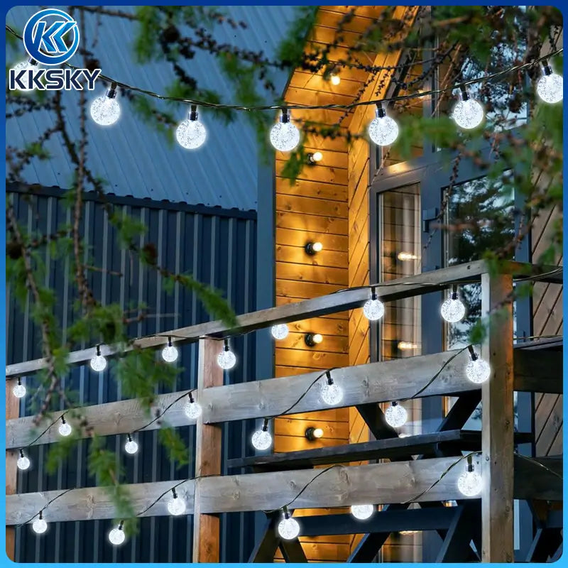 KKSKY cool white crystal bubble globe string lights outdoor balcony scene