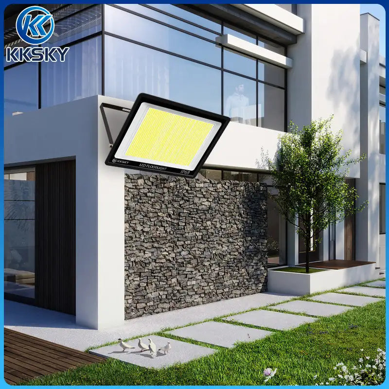 KKSKY real scene usage of Electric LED Flood Light Outdoor Waterproof installed on modern house garden yard for night exterior security lighting