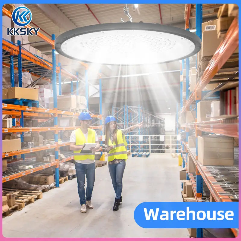 UFO LED high bay light working in warehouse, bright overhead industrial commercial bay lighting