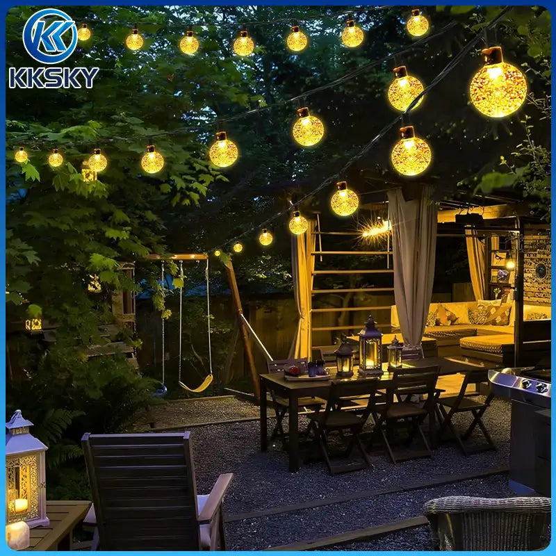 KKSKY warm white plug-in crystal bubble globe LED string lights backyard patio scene